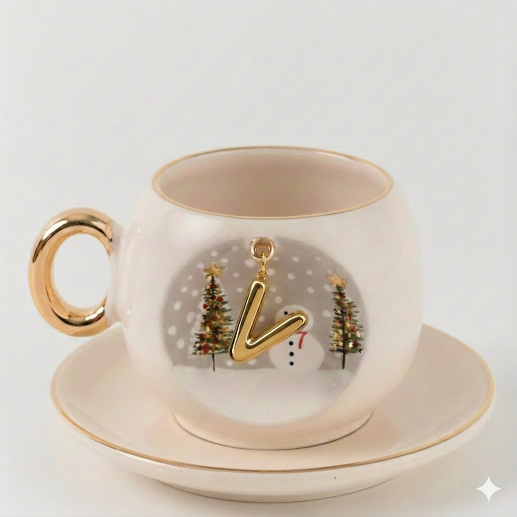 Porcelain coffee cup and saucer set, gold handle, letter V holiday ornament