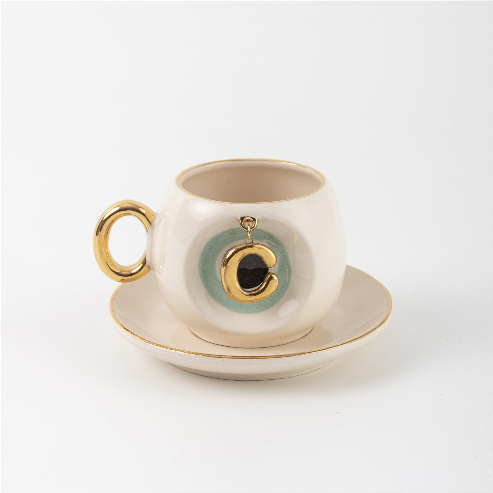 Turkish coffee cup & saucer, white with gold handle, teal letter C charm