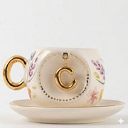 Porcelain Turkish coffee cup and saucer set with gold handle and letter C in gold frame