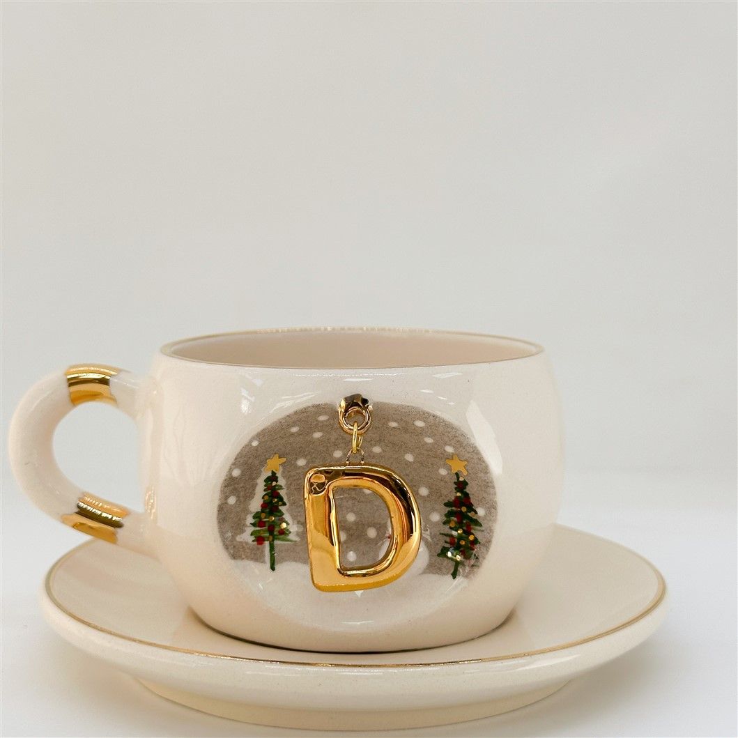 Porcelain tea cup with D letter gold charm, winter trees and dots pattern, 160 ml