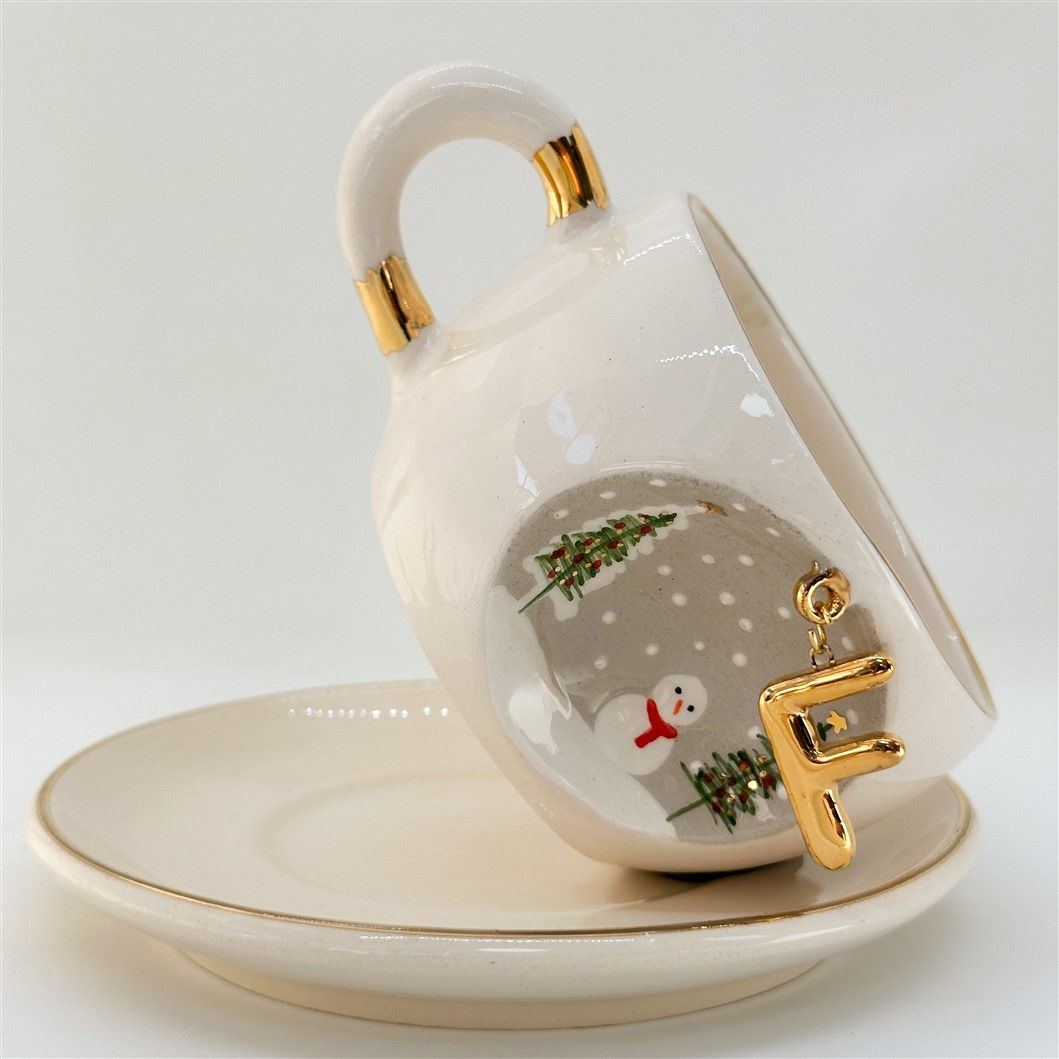Porcelain tea cup with E letter gold charm, winter trees and snowman print