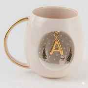 Porcelain mug with gold-trim handle, A charm, winter trees and snowman design