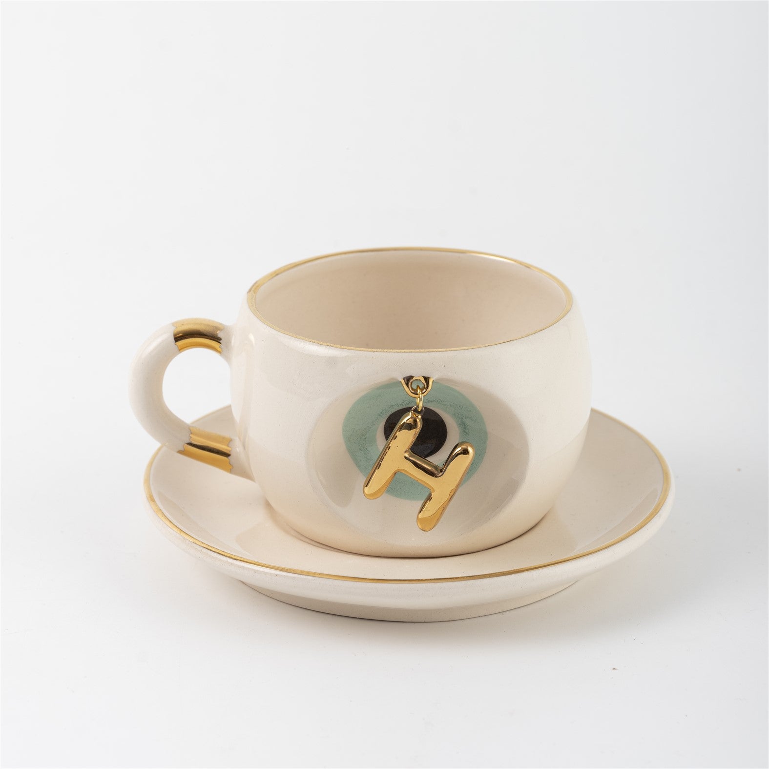 Cream tea mug set with gold letter H charm and saucer, Nile green accents