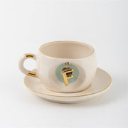 Cream tea mug set with gold letter F charm and saucer, Nile green accents