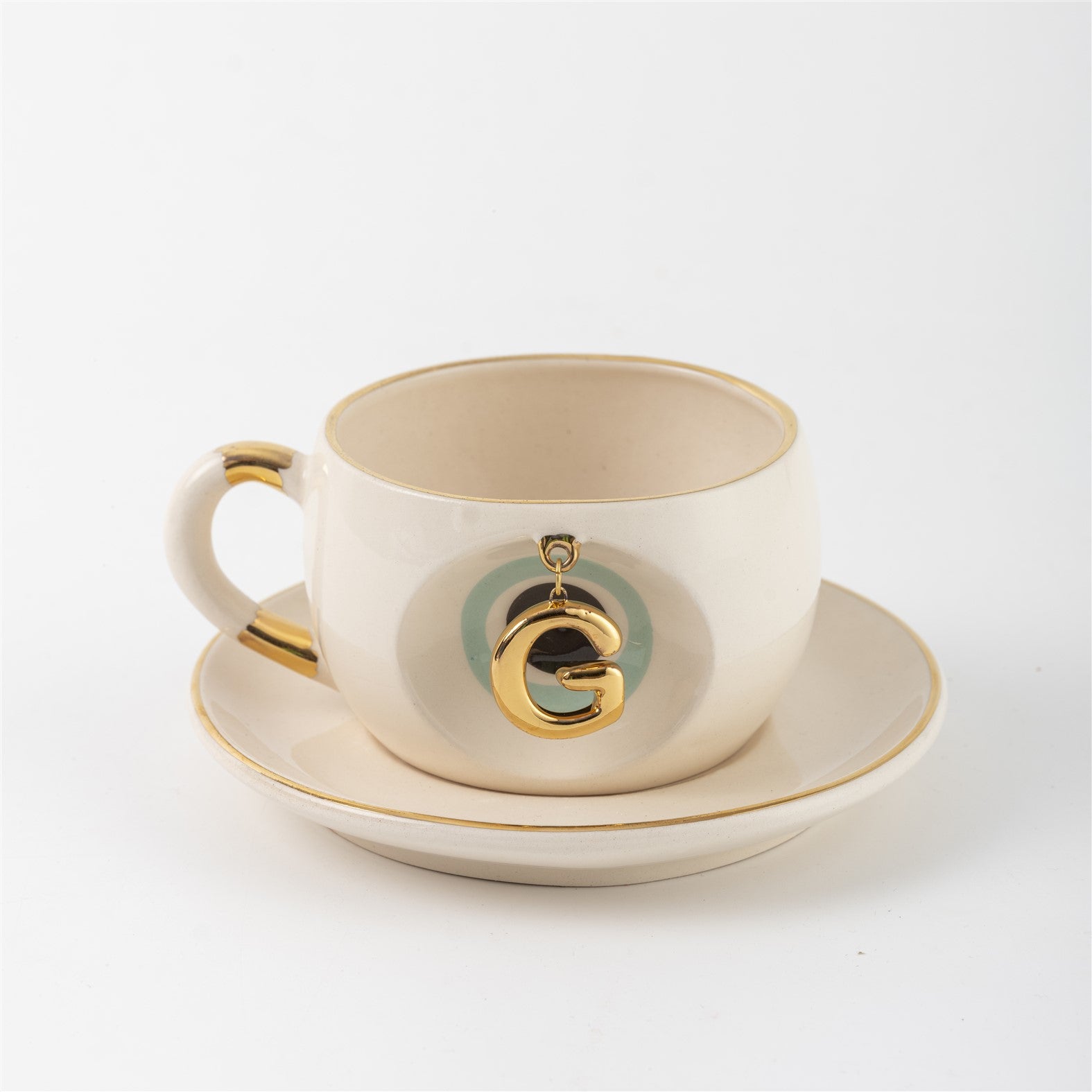 Cream tea mug set with gold letter C charm and saucer, Nile green accents