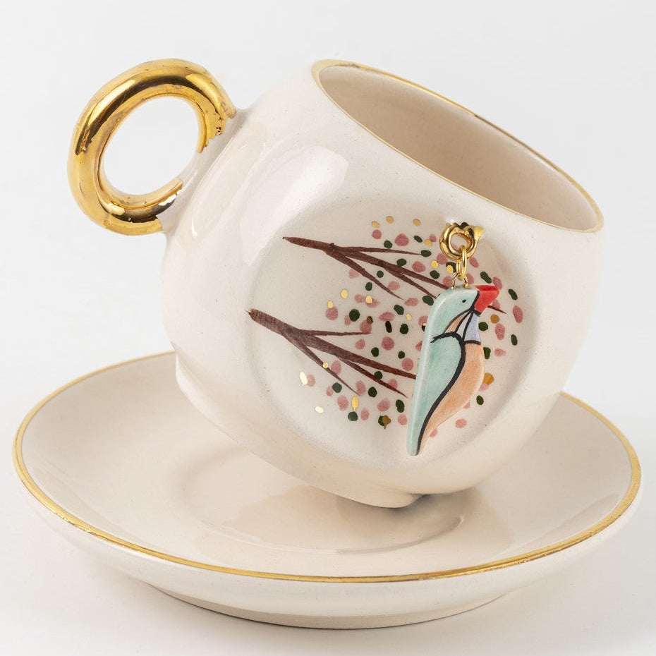 Kingfisher coffee cup and saucer, white porcelain with gold handle and kingfisher decal