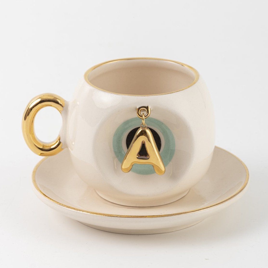 Turkish coffee cup & saucer, white with gold handle, teal letter A charm