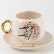 Kingfisher coffee cup with gold handle, white porcelain with kingfisher bird decal on saucer